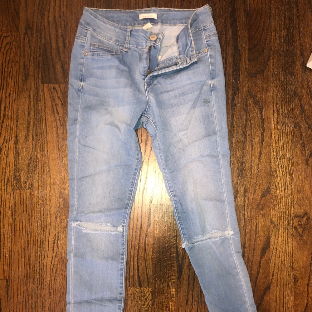 Busted knee jeans